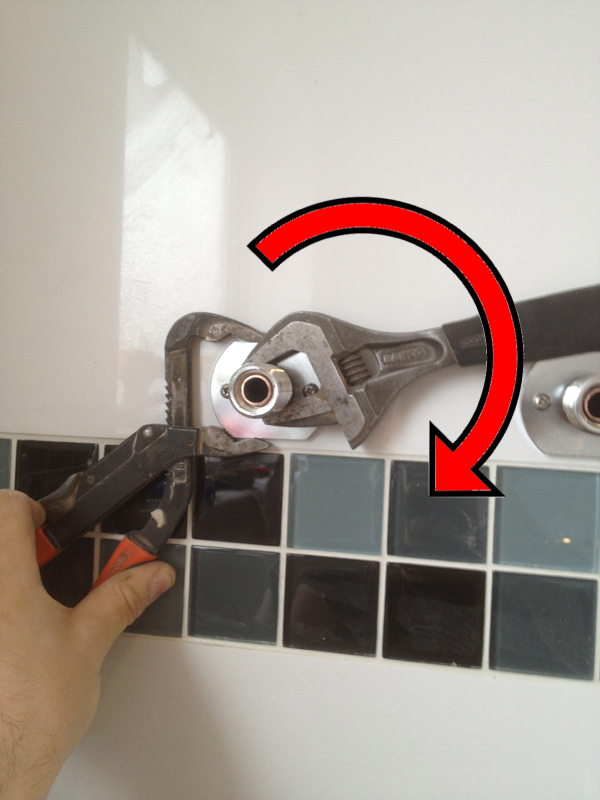 Tighten The Fixing Bridge Against The Wall Plate