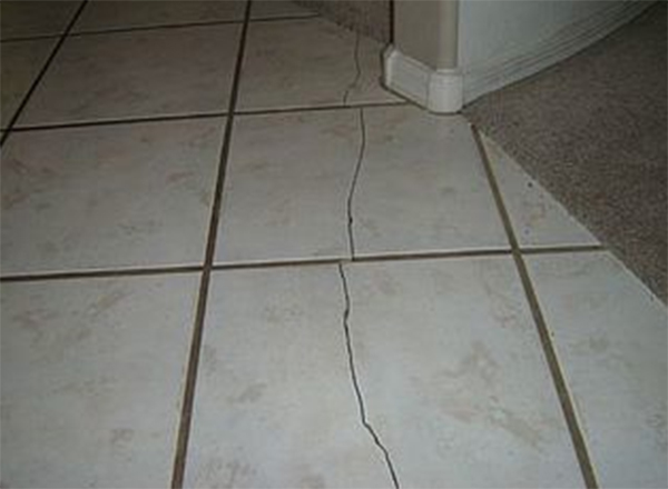 Showing Cracked Tiled Due To Poor Surface Preparation With Bathroom Installation In Leeds