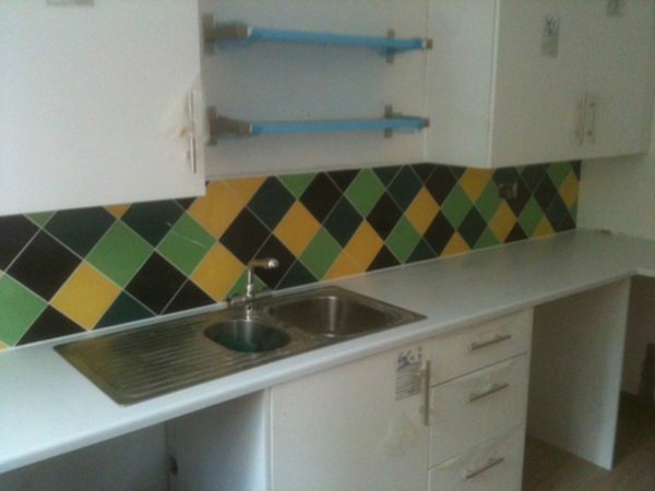 White Grout And Silicone With Colourful Tiles With Bathroom Installation In Leeds