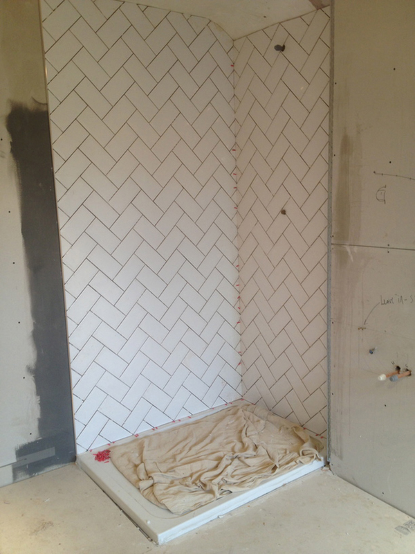 White Subway Tiles With Herringbone Pattern With Bathroom Installation In Leeds