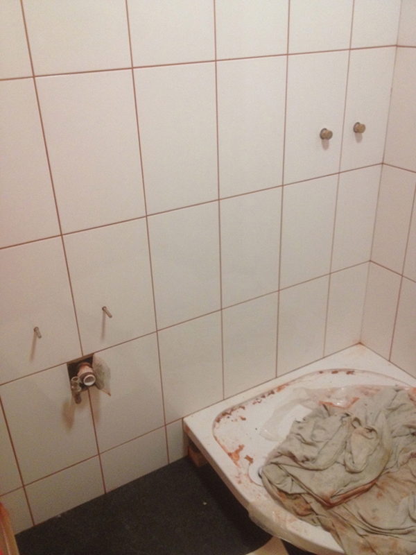 Tiled Wall With Red Grout With Bathroom Installation In Leeds