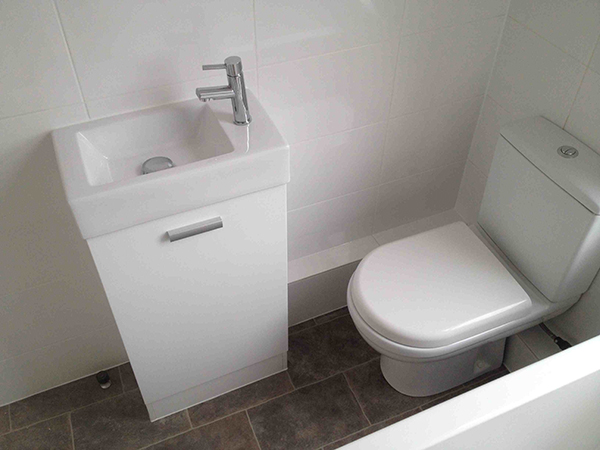 Close Coupled Toilet And Small Basin With Bathroom Installation In Leeds