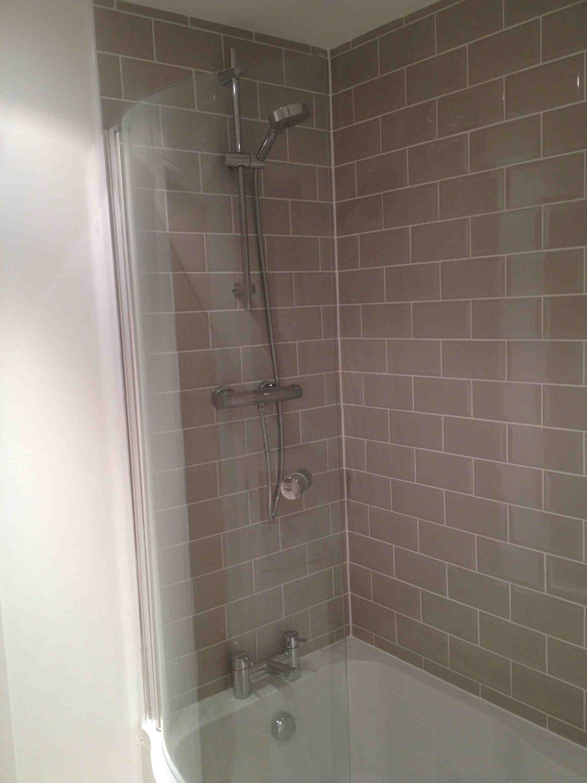 Grey Metro Wall Tiles Around Bath With Bathroom Installation In Leeds