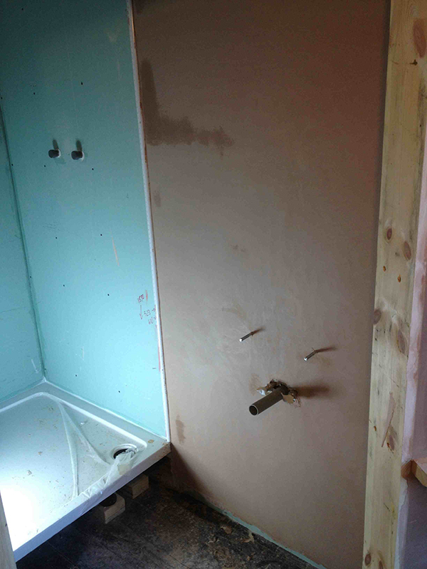 Plastering A Half Tiled Shower Room With Bathroom Installation In Leeds