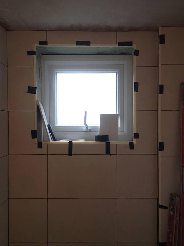 Gluing Tile Trims For A Neat Finish With Bathroom Installation In Leeds