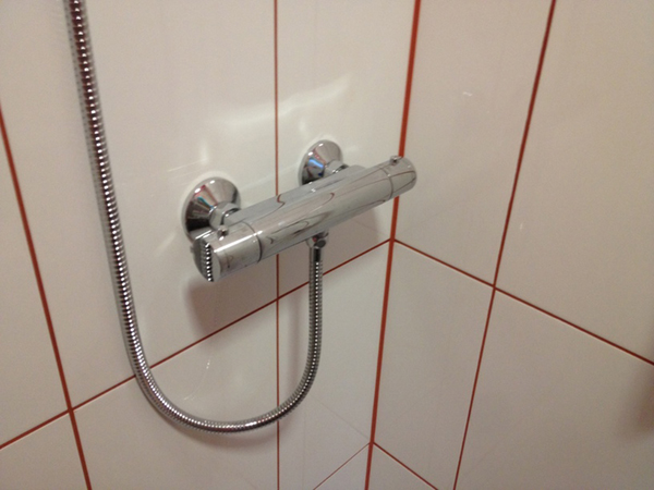 Attaching The Shower Valve With Bathroom Installation In Leeds