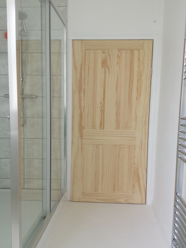 New Door Fitted To New Door Frame With Bathroom Installation In Leeds