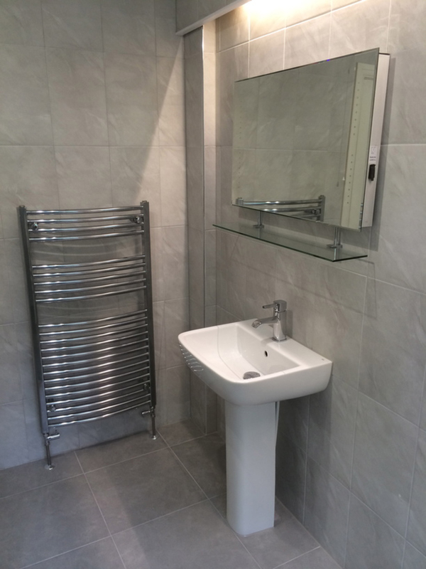Basin, Mirror And Towel Radiator With Bathroom Installation In Leeds