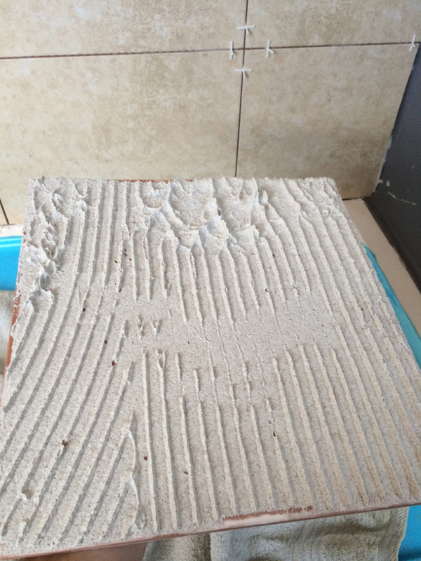 Insufficient Tile Adhesive Coverage With Bathroom Installation In Leeds