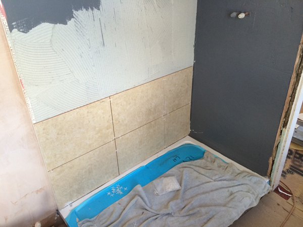 Tiling Off The Shower Tray With Bathroom Installation In Leeds