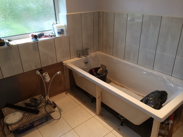 Tiling Around A Bath With Bathroom Installation In Leeds