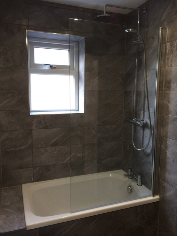 Short Bath With Shower Above With Bathroom Installation In Leeds