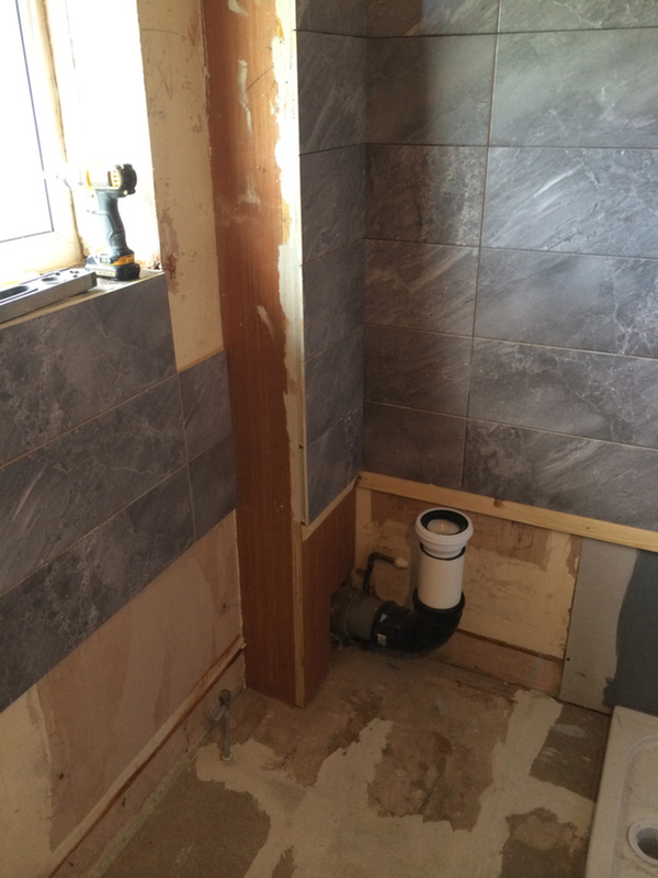 Half Tiled Bathroom With Bathroom Installation In Leeds