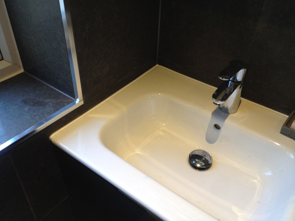 Black Porcelain Tiles With Dark Grey Grout And Chrome Trims With Bathroom Installation In Leeds