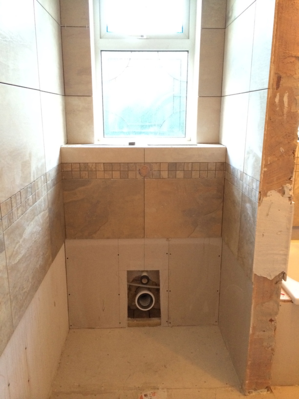 back to wall toilet tiling