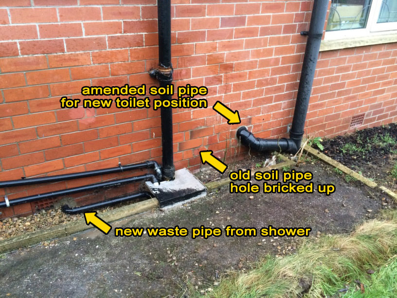 outside drainage and bricked up pipework