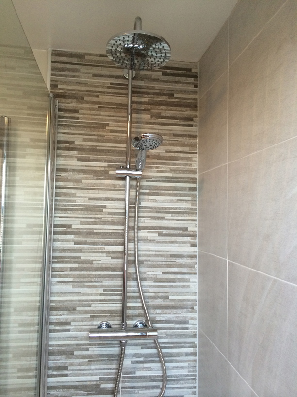 Feature tiles with thermostatic mixer shower