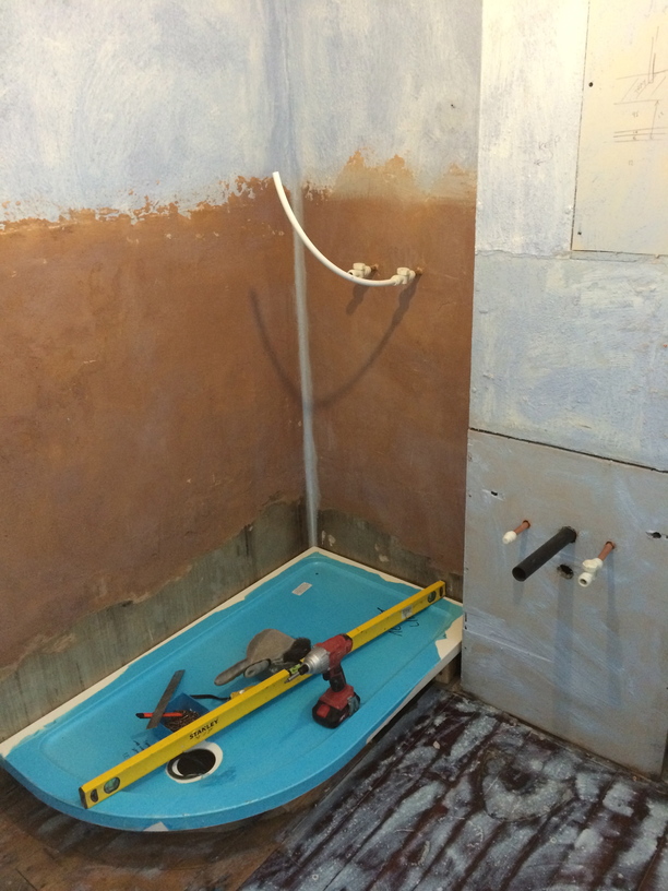 Fitting a shower tray in place of a bath