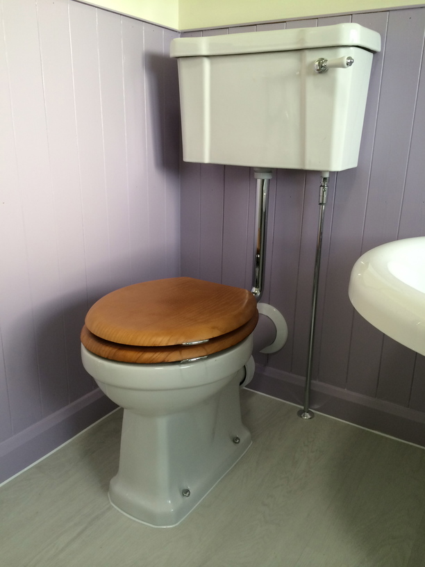 traditional toilet with high level cistern