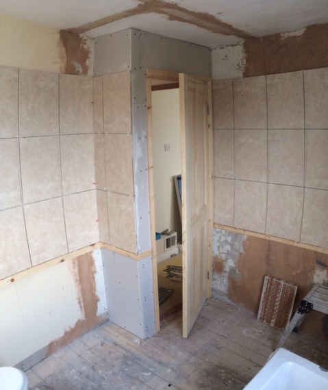 new entrance into combined WC & bathroom