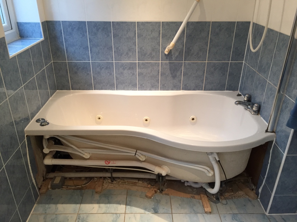 existing bath removed in wet room installation
