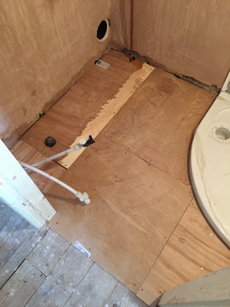 Floorboards covered prior to fitting vinyl flooring