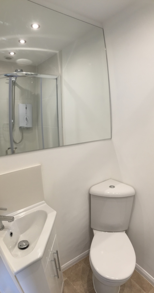 WC & basin fitted with large custom made mirror